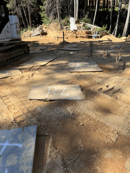 pier holes covered with plywood